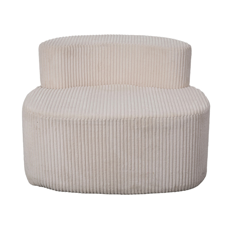 Sofá individual de pana beige claro con respaldo curvo
