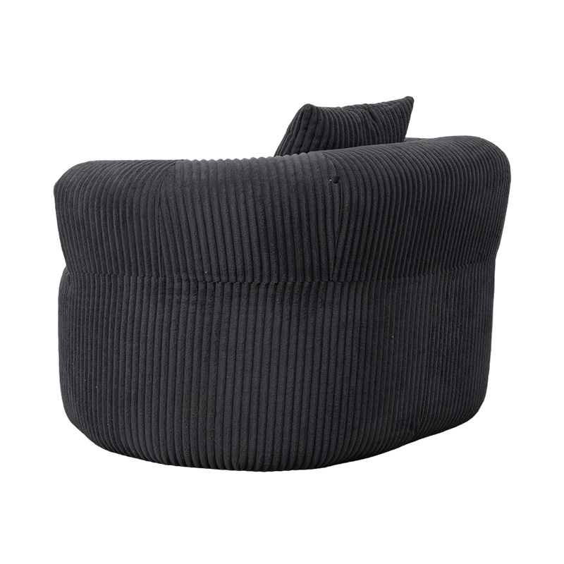 Sofá envolvente individual de espuma integral en pana gris oscuro con cojines a juego