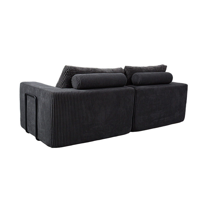 Sofá convertible moderno en pana gris oscuro con cojines, diseño modular flexible