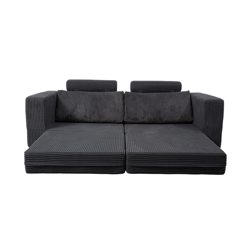 Sofá convertible moderno en pana gris oscuro con cojines, diseño modular flexible