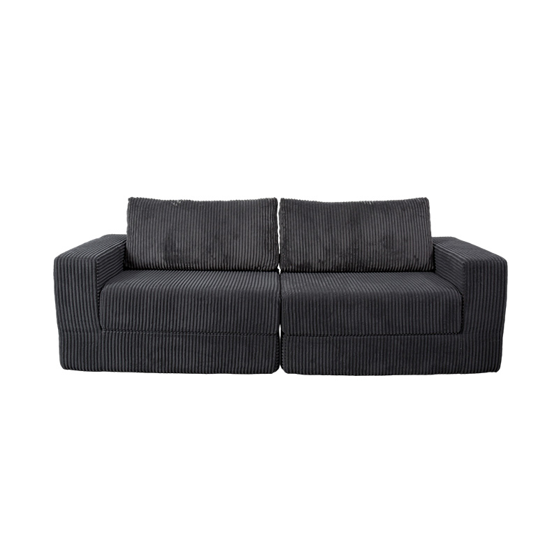 Sofá convertible moderno en pana gris oscuro con cojines, diseño modular flexible