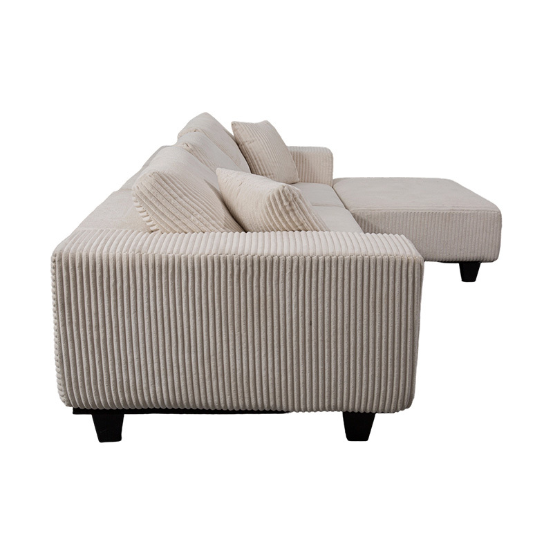 Sofá esquinero grande en forma de L de pana color blanquecino con diseño minimalista moderno Sofá esquinero grande en forma de L de pana color blanquecino con diseño minimalista moderno